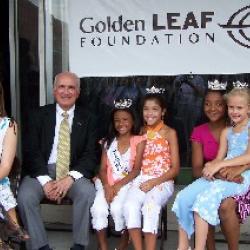 Senator David Weinstein poses with the Fairmont Farmers Festival Queens.