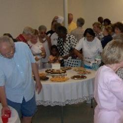 Citizens enjoy refreshments before touring the building.